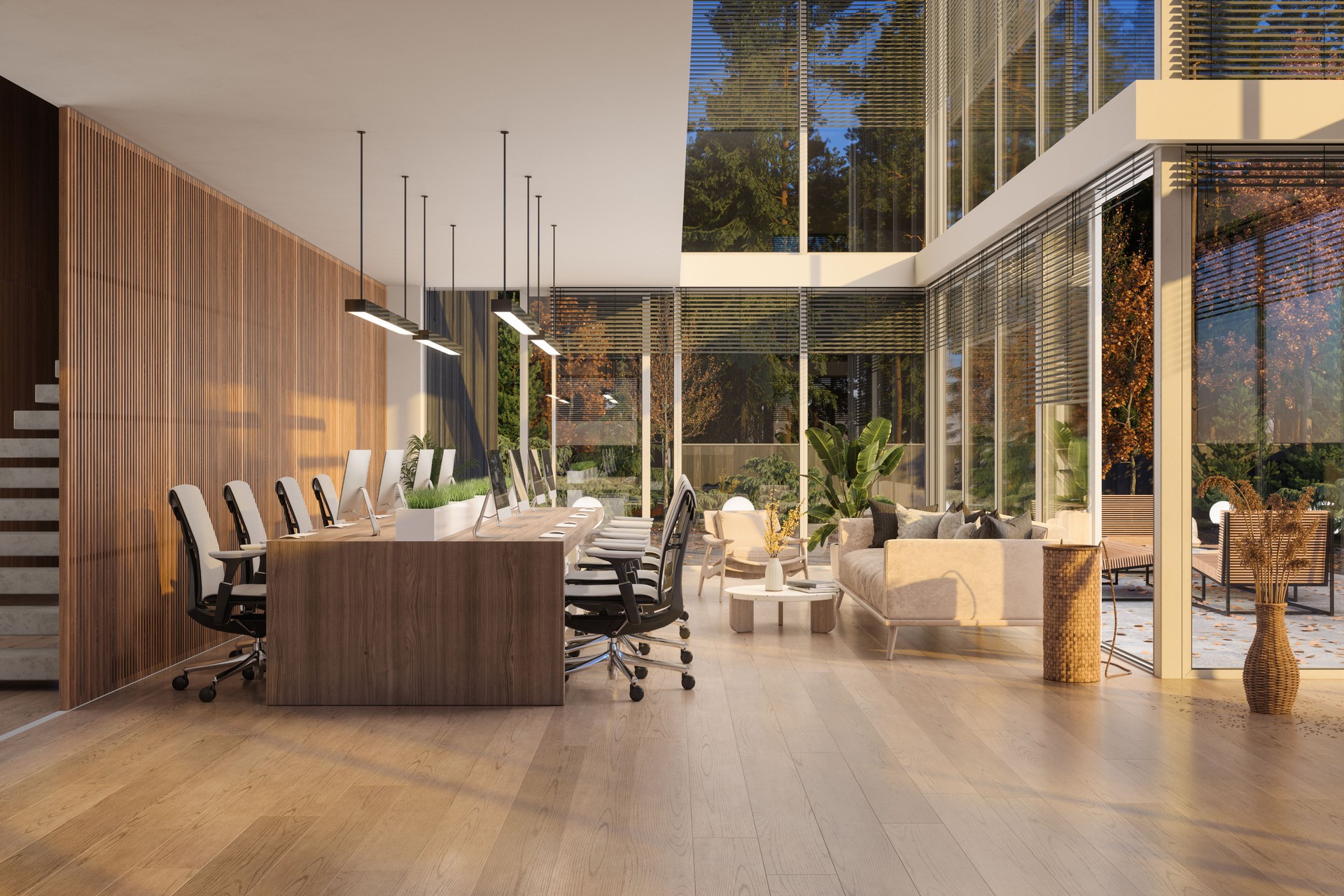 Modern Open Plan Co-working Office Space With Table, Office Chairs, Computers And Sofa